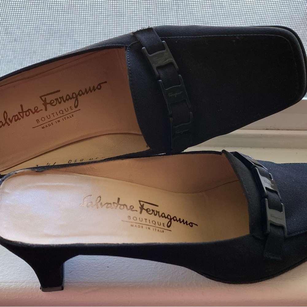 Heeled Ferragamo sandals in black fabric